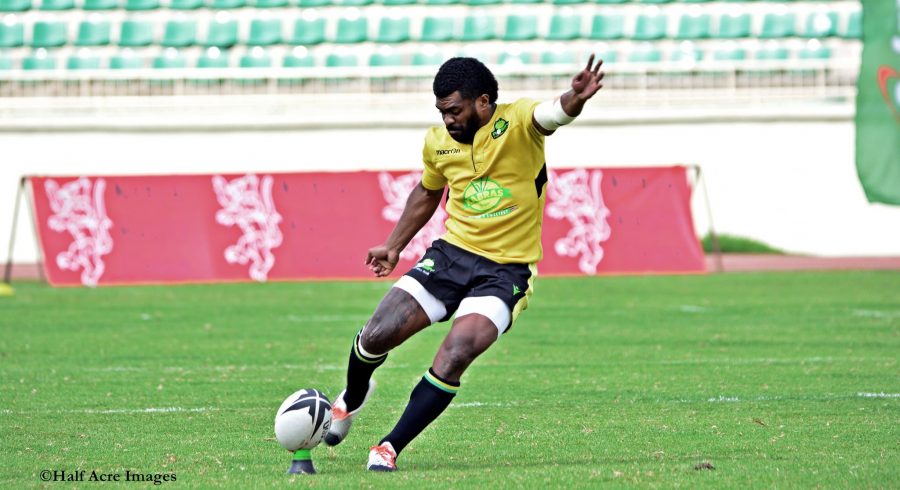 Kabras' Jone Kubu takes a kick in a past match . Photo Courtesy/Denis Acre-Half.