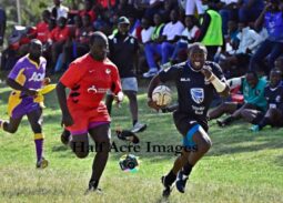 Mwamba Ronnie Omondi races away from Impala's Tony Khadambi. Photo Courtesy/Denis Acre-Half