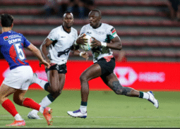 Kenya 7s Collins Shikoli attacks against the France defense on day one of the HSBC France Sevens men's competition at Stade Toulousain on 20 May, 2022 in Toulouse, France. Photo credit: Mike Lee - KLC fotos for World Rugby
